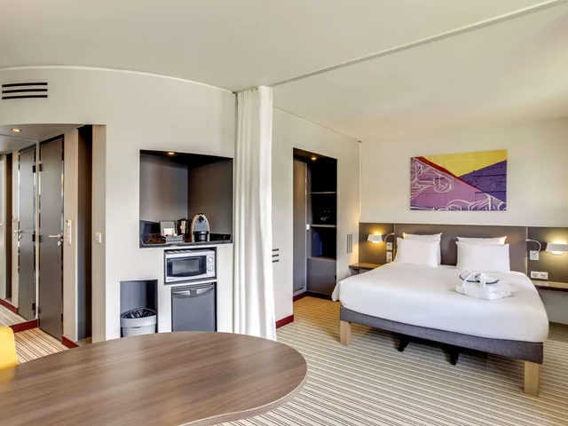 جناح تنفيذي بسرير مزدوج مع أريكة، Novotel Suites Paris Stade De France 4/10
