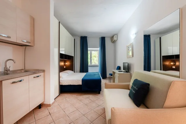 غرفة ثلاثية بفراش فوتون وسرير مزدوج وسرير فردي، Hotel Residence Sant Angelo 3/6