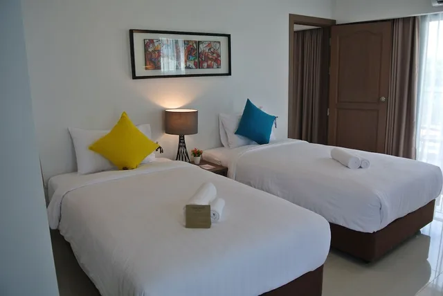 غرفة ديلوكس عائلية بسرير كينج وسريرين منفصلين بإطلالة على البحر بجاكوزي، Riche Hua Hin 7/9