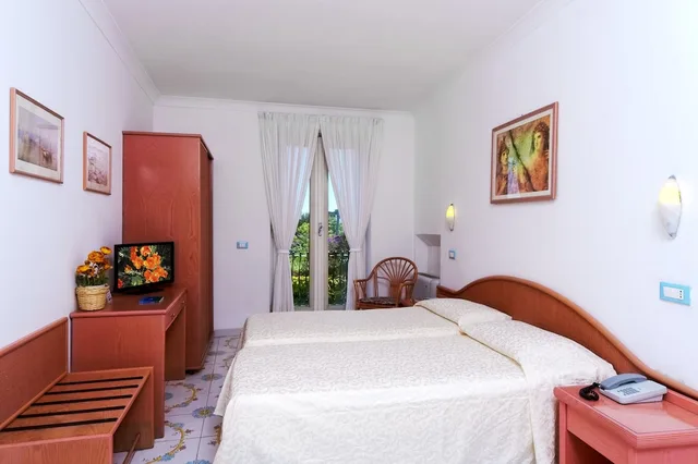 غرفة قياسية ثلاثية بسرير كوين وسرير فردي، Hotel Bellevue Benessere and Relax 1/4
