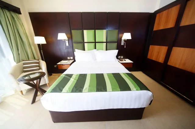 غرفة ديلوكس بسرير كوين، Best Western Premier Garden Hotel Entebbe 4/7