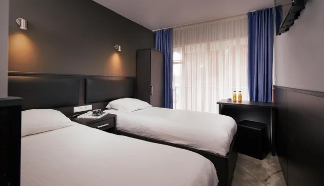 غرفة بسريرين منفصلين، Belfort Hotel Amsterdam 1/4