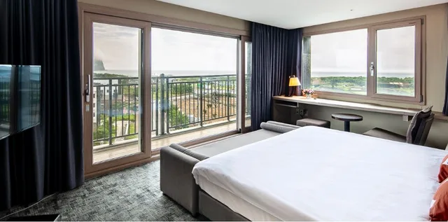 غرفة بسرير كينج بجاكوزي، The Best Jeju Seongsan Hotel 1/2