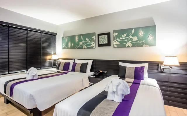 غرفة غراند ديلوكس ثلاثية بسرير مزدوج وسرير فردي، Nouvo City Hotel 5/9