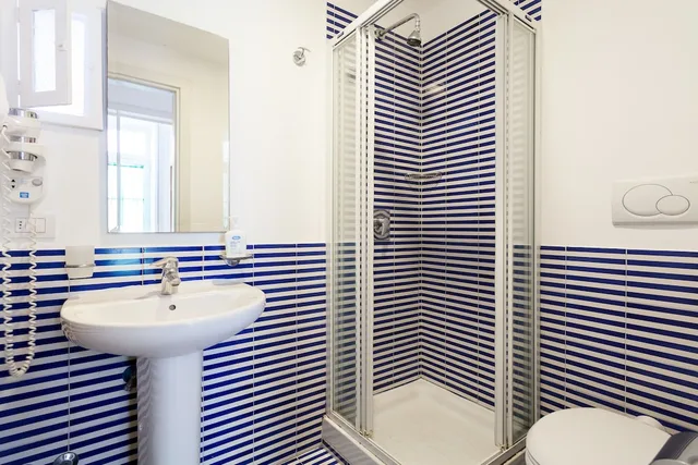 جناح عائلي بسرير كوين وسريرين منفصلين مع أريكة، Corso Italia Suites 10/10