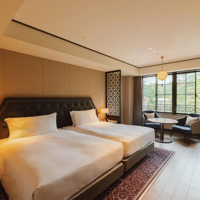 غرفة بسريرين منفصلين بشرفة، MAMPEI HOTEL 1/3