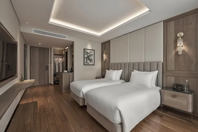 غرفة ديلوكس بسريرين منفصلين، La Siesta Premium Sai Gon 1/3