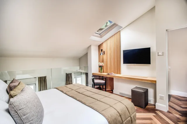 جناح غراند بسرير كينج وسريرين منفصلين مع أريكة، DBH Duomo Boutique Hotel Lake Como 1/4