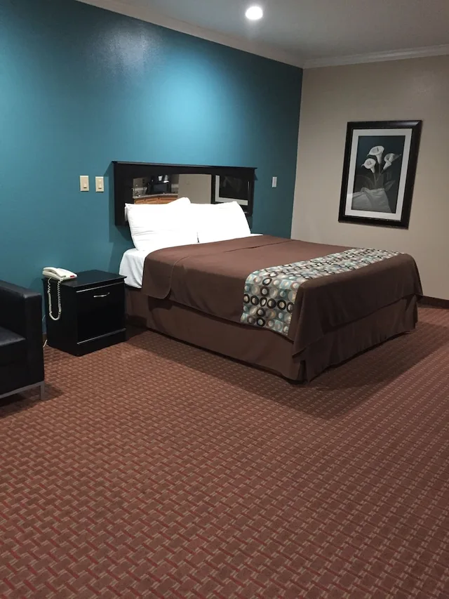 غرفة ديلوكس مفردة بسرير كينج، Scottish Inns Suites Timber Creek Houston 1/3