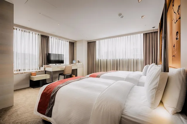 غرفة ديلوكس بثلاثة أسرّة مع سرير إضافي، Green World Hotel Grand Nanjing 2/7
