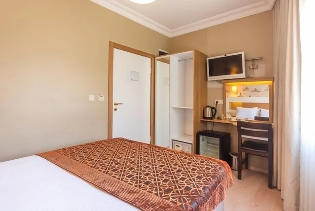 غرفة قياسية بسرير كوين وسرير مزدوج بغرفة نوم واحدة، TAYA HATUN HOTEL 5/10