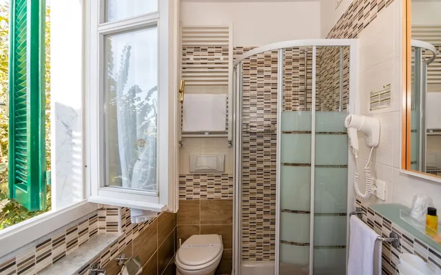 غرفة قياسية ثلاثية بسرير كوين وسرير فردي، Hotel Eura 7/8