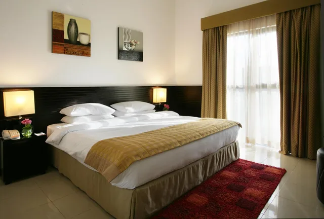 جناح للمدخنين، Ramada Hotel and Suites By Wyndham Ajman 1/5
