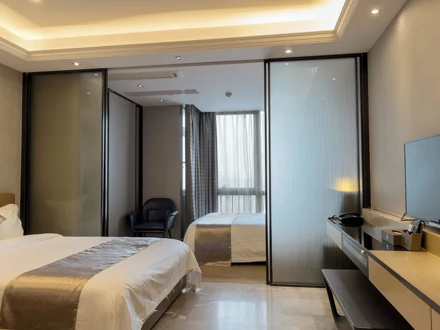 استوديو تنفيذي بسريرين منفصلين وسريرين كوين، Pengman International Apartment Hotel (Beijing Road Jiedeng Duhui) 3/9