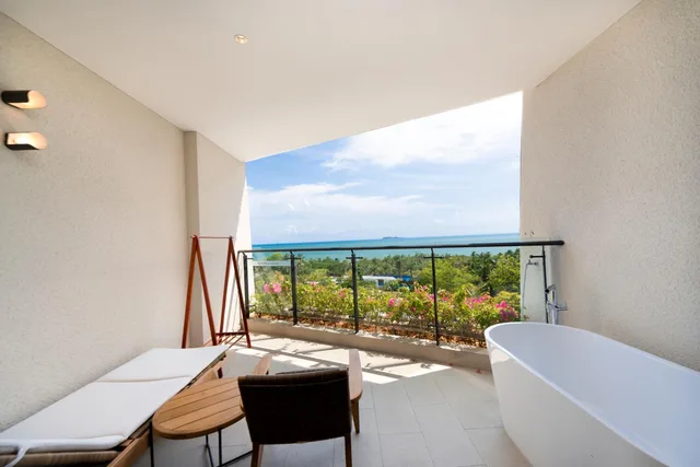 غرفة بسريرين منفصلين بإطلالة على البحر، Sanya Conifer Resort 3/6