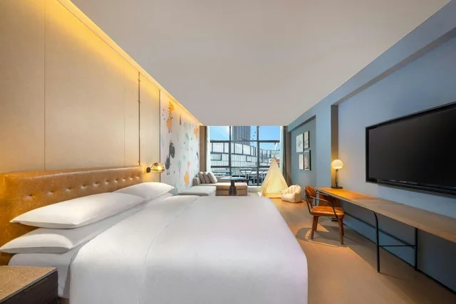 غرفة عصرية عائلية بسرير كينج بإطلالة على المدينة، Four Points by Sheraton Chongqing, Yongchuan 1/3