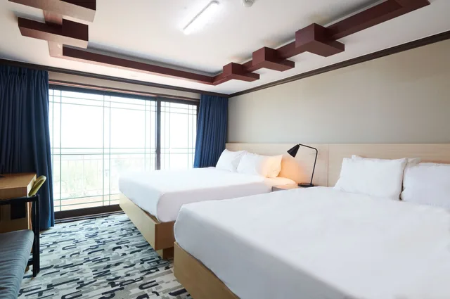 غرفة ديلوكس بسريرين منفصلين وسريرين كينج بإطلالة على البحر، Good Morning Hotel and Resort 1/2