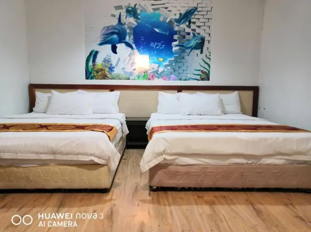 غرفة عائلية بسريرين كوين، Mega Inn 2/2