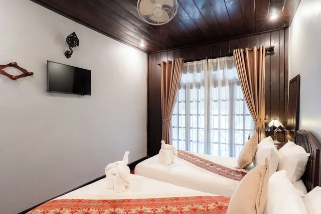 غرفة ديلوكس بسريرين منفصلين بإطلالة على النهر، Villa Ban Lakkham 2/7
