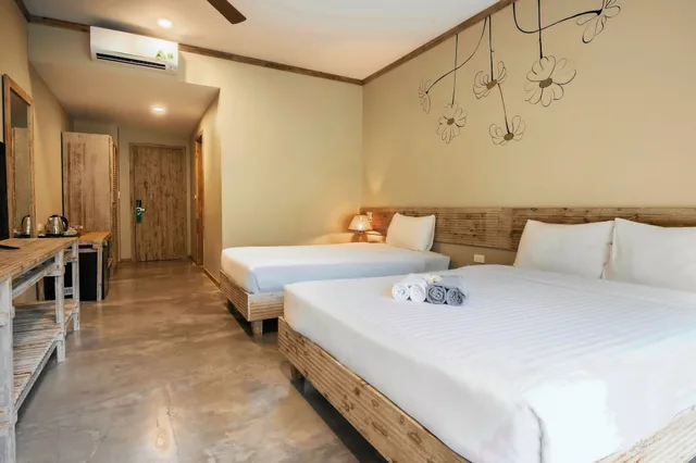 غرفة ديلوكس بسريرين منفصلين بإطلالة على الحديقة، LAHANA RESORT PHU QUOC 1/5