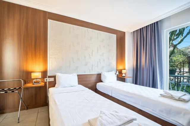 غرفة بسرير مزدوج أو سريرين منفصلين بشرفة، Dedeminn Garden Hotel 4/10