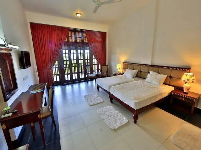 1 Bedroom, Deluxe, Queen Bed, Beach View, Marina Beach Passikudah 1/5