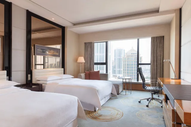 غرفة ديلوكس بسريرين منفصلين، Sheraton Zhongshan 1/3