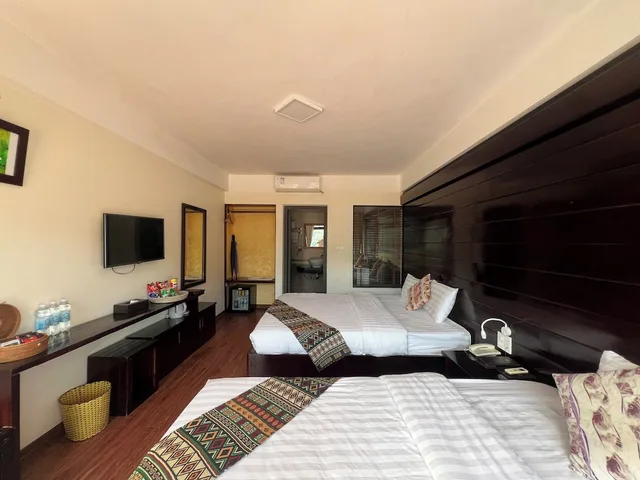 غرفة ديلوكس بانورامية بسريرين منفصلين بإطلالة على المدينة بشرفة، Sapa Village Hotel 5/10