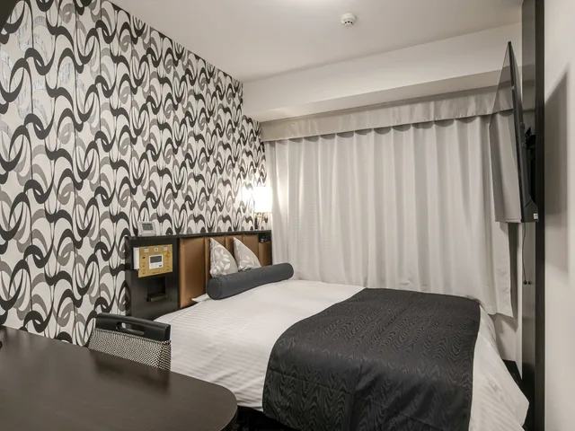 غرفة مفردة بسرير مزدوج في طابق مرتفع، APA Hotel Nagoya Ekimae 1/2