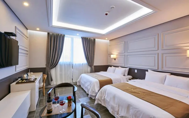 غرفة ديلوكس عائلية بسريرين مزدوجين، Madrid Hotel Gwangju 1/2