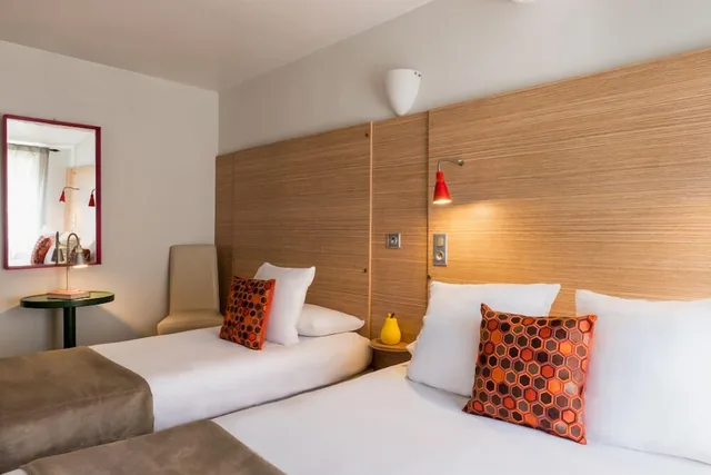 غرفة أساسية ثلاثية بسرير مزدوج وسرير فردي، Hotel Edmond Rostand 2/3