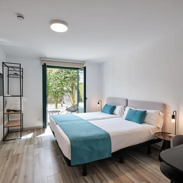 غرفة بسرير مزدوج أو سريرين منفصلين، Pombal Rooms Santiago 4/10