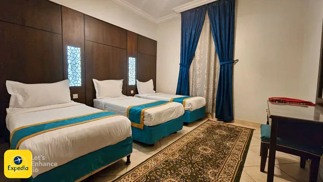 شقة ديلوكس بسرير كينج وثلاثة أسرّة بغرفتي نوم، لازورد بالاس للشقق الفندقية(Lazourd Palace Hotel Apartments) 2/4