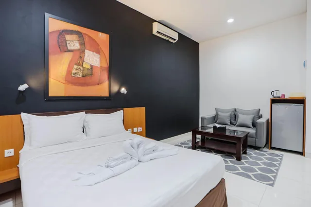 غرفة بريميير ديلوكس، Jambuluwuk Heritage Menteng Suites 1/1
