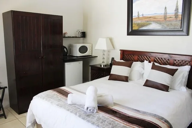 غرفة اقتصادية بسرير كوين، Amani Guest Lodge 1/2