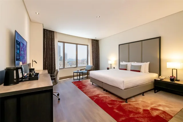 جناح عائلي بسريرين منفصلين وسريرين كينج بـ3 غرف نوم بمطبخ صغير، The K Hotel, WorldHotels Distinctive 1/5