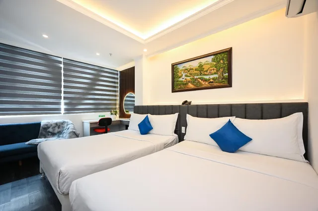 غرفة عائلية بإطلالة على المدينة، Ruby Saigon Hotel and Suite Ben Thanh 1/2