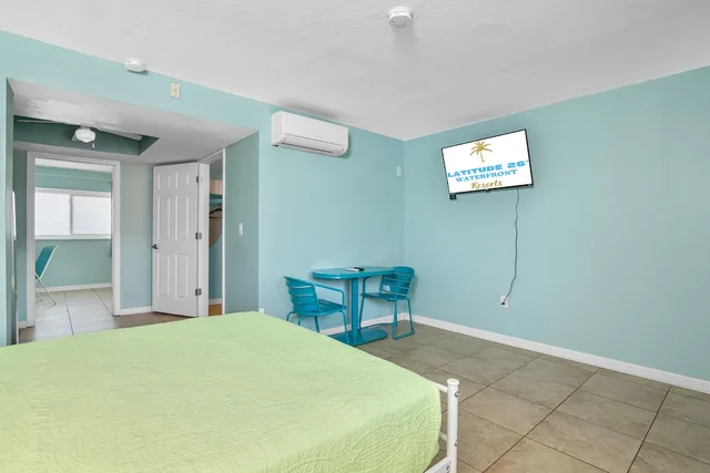 جناح ديلوكس بسرير كينج وسرير كوين بغرفتي نوم بمطبخ، Latitude 26 Waterfront Resort & Marina 6/9