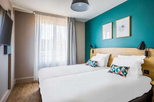 شقة بسرير كوين مع أريكة، Appart City Confort St Quentin en Yvelines Bois d Arcy 1/4