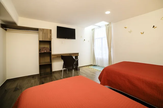 غرفة قياسية ثلاثية بسرير مزدوج وسرير فردي، Capital O Hotel Boutique Las Torres 1/5