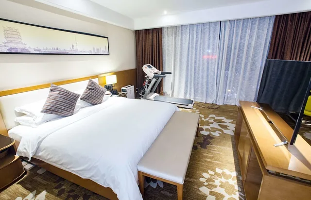 جناح بسرير كينج للمدخنين، Ramada Encore by Wyndham Wuhan 1/2
