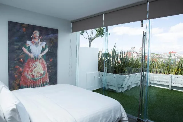 غرفة ديلوكس بشرفة، Ikonik Hotel Puebla 1/1