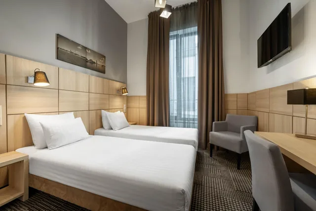 غرفة قياسية صغيرة بسرير مزدوج أو سريرين منفصلين، Wellton Centrum Hotel & SPA 1/2