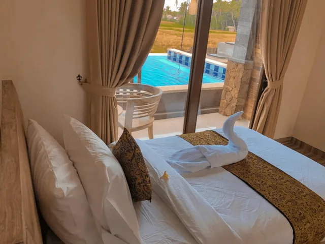 غرفة بسرير مزدوج بإطلالة على المسبح، The Sawah Resort and Villa 3/3