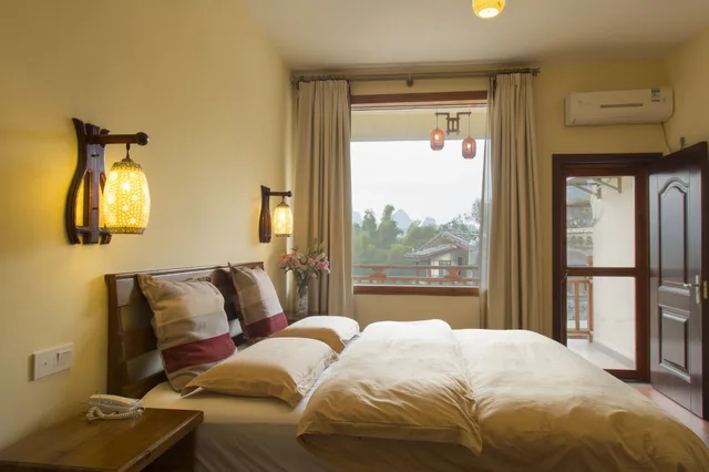 غرفة رباعية بسرير كوين وسريرين منفصلين، Snow Lion Riverside Resort 6/10