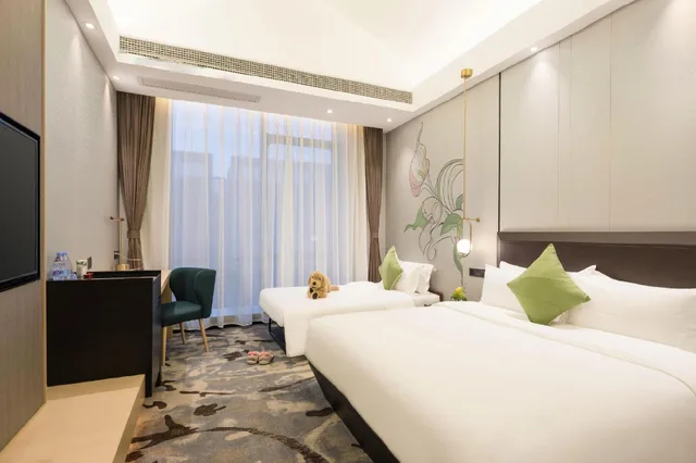 غرفة مريحة عائلية بسرير كوين وسرير فردي، Buddy Hotel 1/2