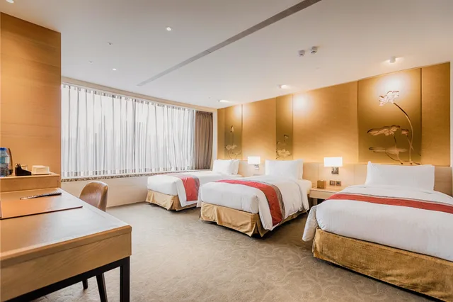 غرفة ديلوكس ثلاثية بثلاثة أسرّة بحوض استحمام، Green World Hotel Grand Nanjing 4/7