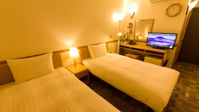 غرفة بسريرين منفصلين للمدخنين، Toyoko Inn Kagoshima Temmonkan No.2 5/5