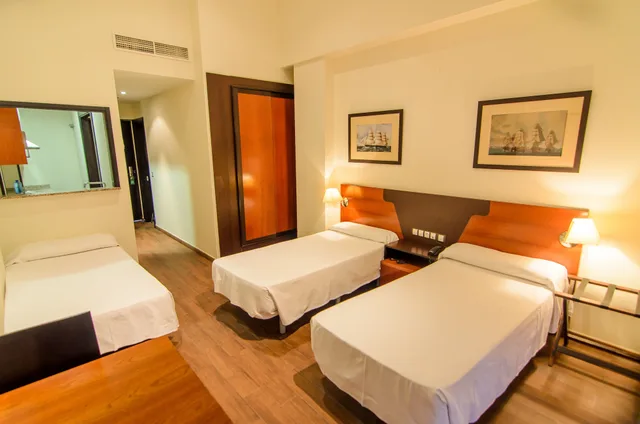 غرفة ثلاثية بسرير فردي، Hotel Apartamento Martin Alonso Pinzon 1/6