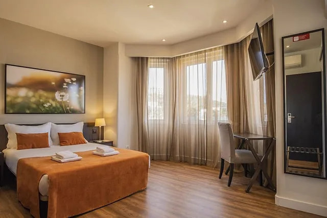 غرفة ثلاثية بسرير مزدوج وسرير فردي، Riversuites 1/5